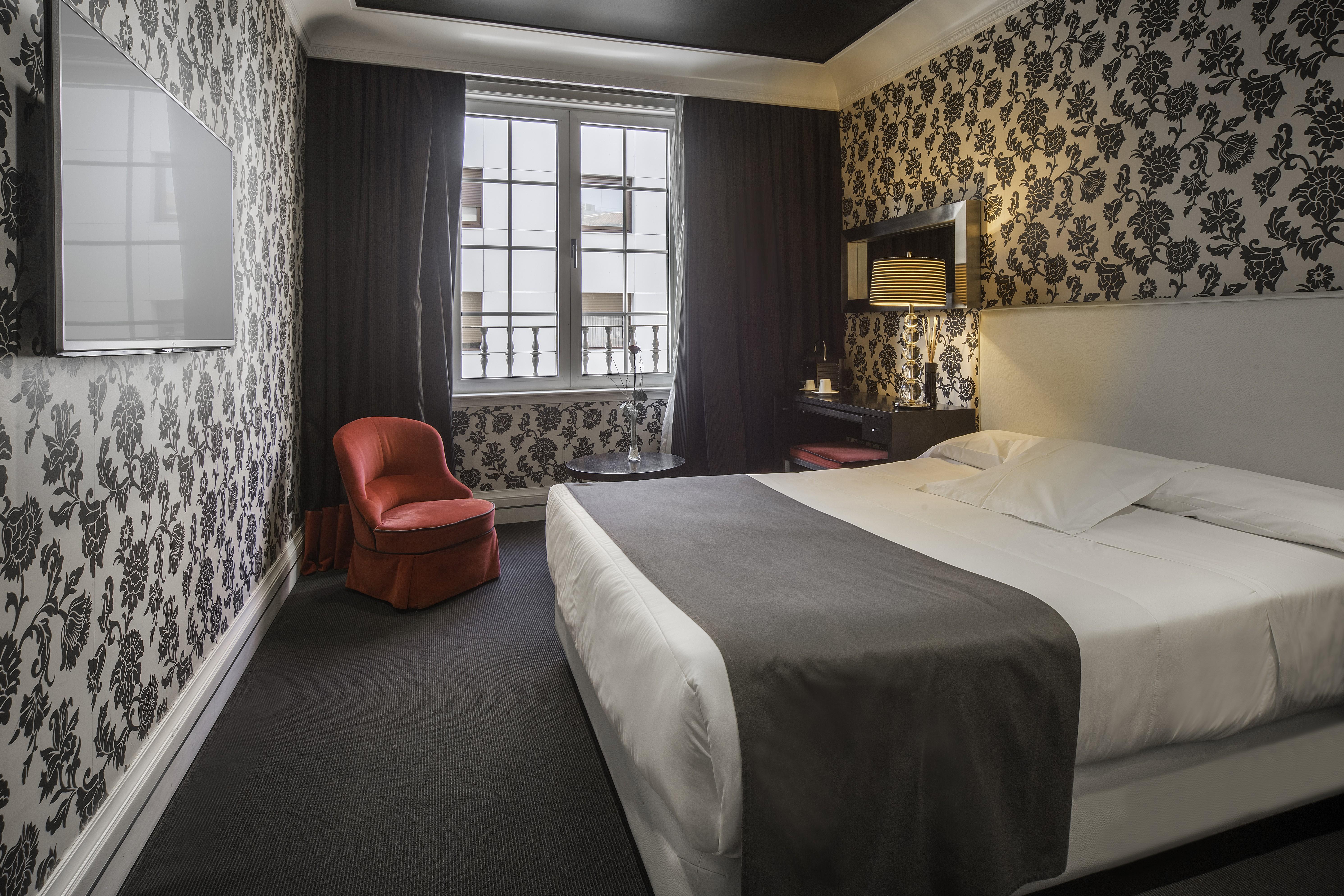فندق لوبيز دي هارو بلباو المظهر الخارجي الصورة A room at the hotel